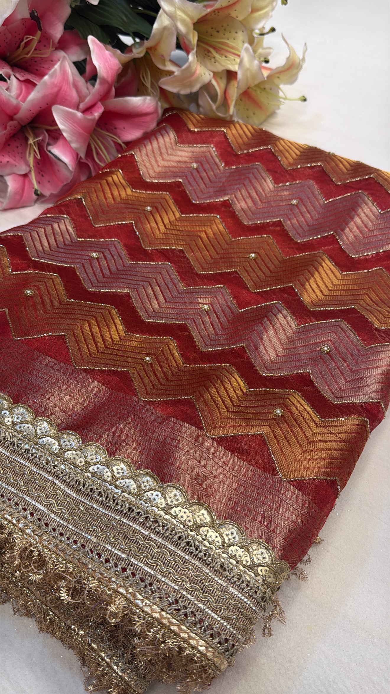 Tomato red husn tissue silk hand embroidered kadhwa saree
